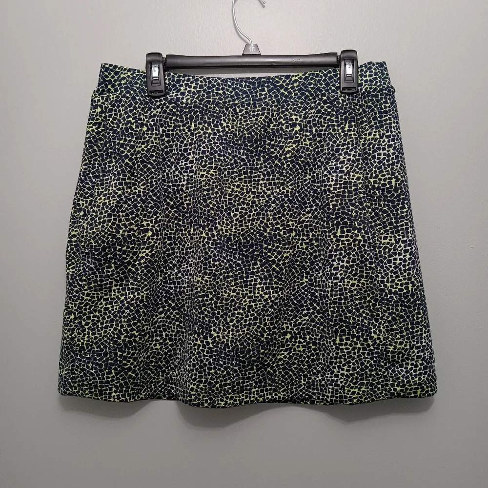 Tail women's golf skort size L animal prints green and black